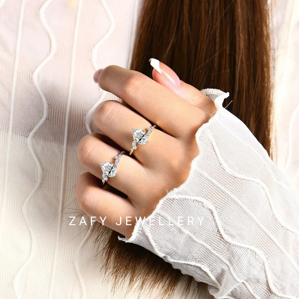 Elara Pave Pear Shape Moissanite Ring D VSS1 Color 925 Silver Pass