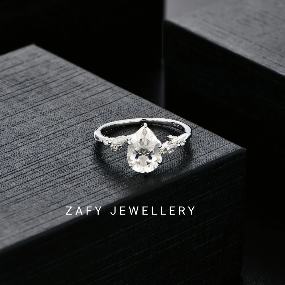 Elara Pave Pear Shape Moissanite Ring D VSS1 Color 925 Silver Pass