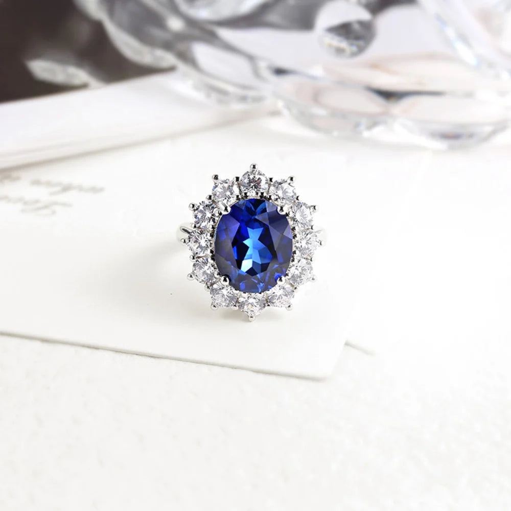 Royale Sapphire Ring – 6.0CT Oval Cut Sea Blue Gem in Classic Eternity Setting