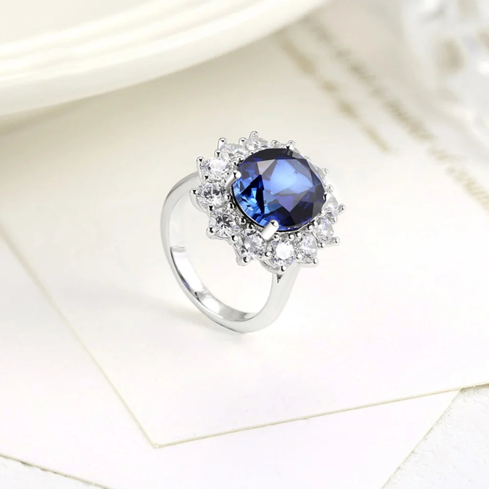 Royale Sapphire Ring – 6.0CT Oval Cut Sea Blue Gem in Classic Eternity Setting